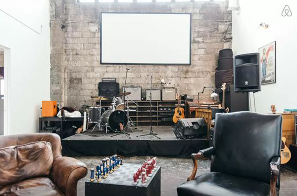 vintage-inspired-home-music-studio-with-exposed-brick-wall ...