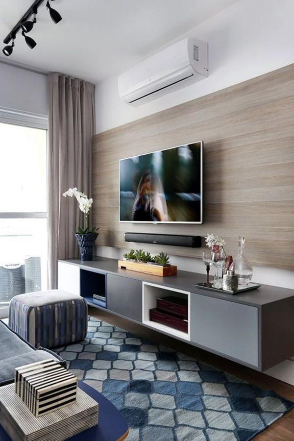 unique-tv-wall-unit-setup-with-wood-accents