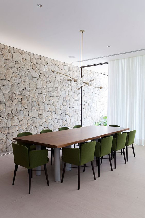 contempory-dining-room-design-with-stone-wall-decor