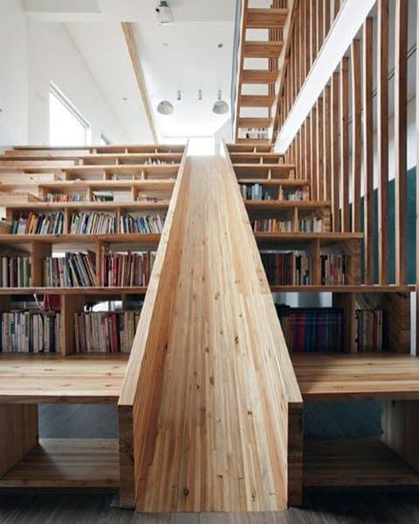 wooden-staircase-with-bookshelf-and-play-slide