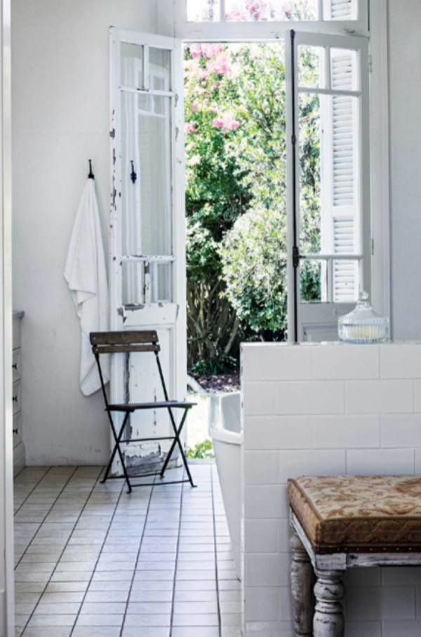 antique-bathroom-with-reclaimed-french-doors