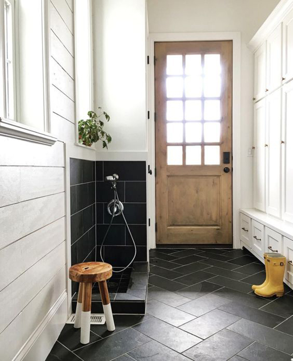 black-entryway-floor-tiles-with-dog-washing-station