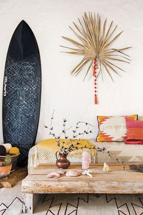 cool-boho-coastal-living-room-with-black-surfboard