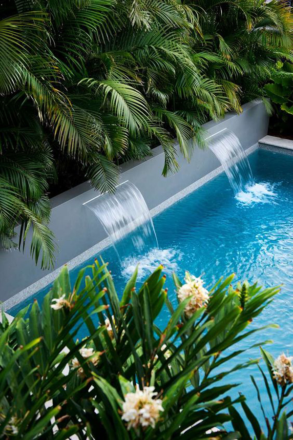 tropical-poolside-garden-with-water-fountain