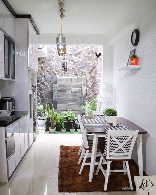 minimalist-white-kitchen-design-integrated-with-small-garden