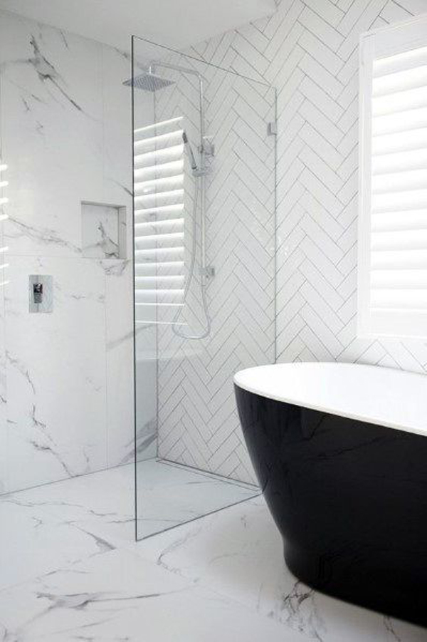 small-white-bathroom-design-with-black-bathtub