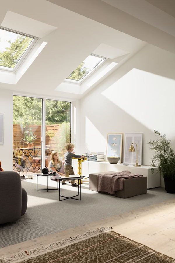 cozy-family-room-with-glass-wall-and-skylights