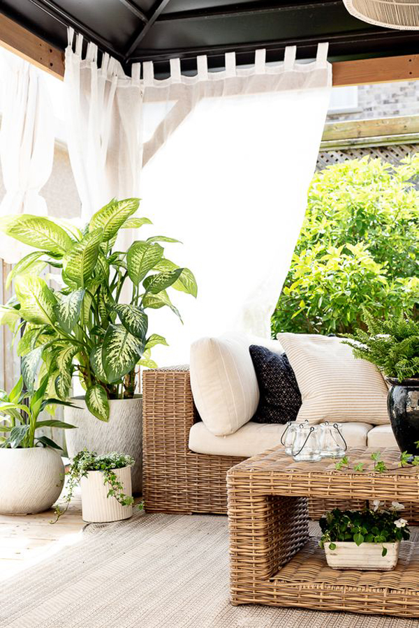 nature-inspired-tropical-porch-with-rattan-sofas