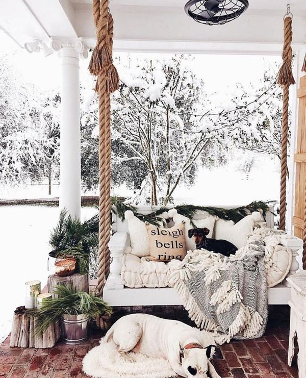 cozy-winter-front-porch-with-swing-chairs