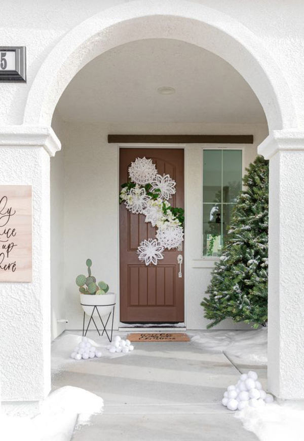winter-christmas-porch-decor-with-snowflake-door