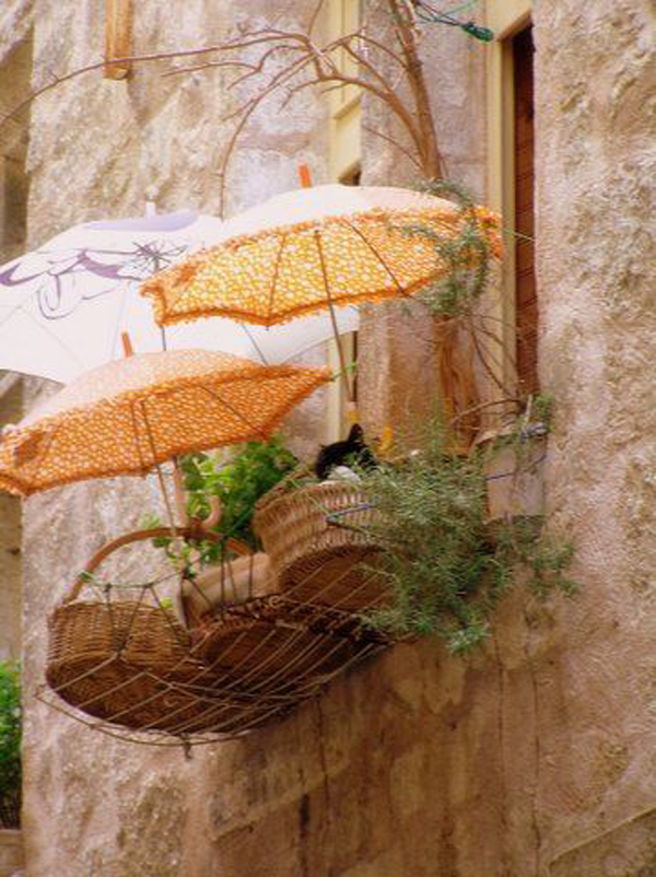 adorable-cat-hammock-basket-in-the-balcony