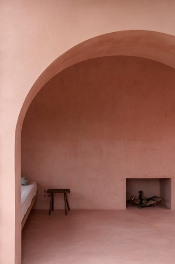 open-bedroom-with-traditional-fireplace