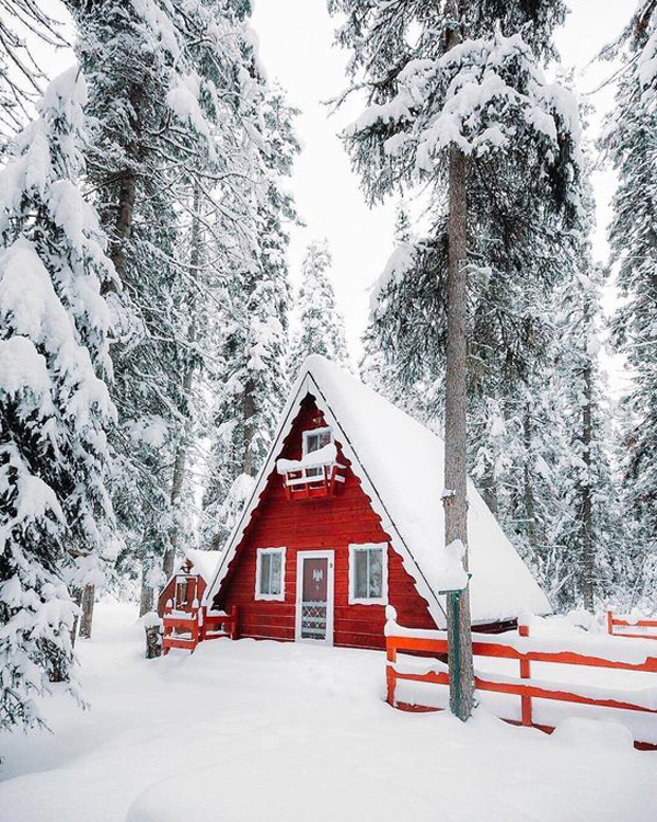 small-red-a-frame-house-in-the-snow