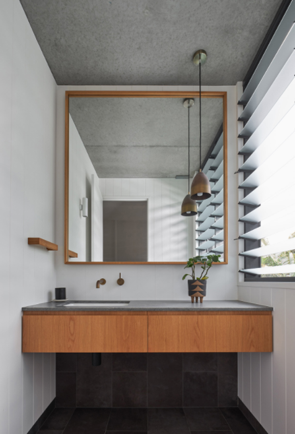 wooden-and-concrete-bathroom-sink-with-mirror