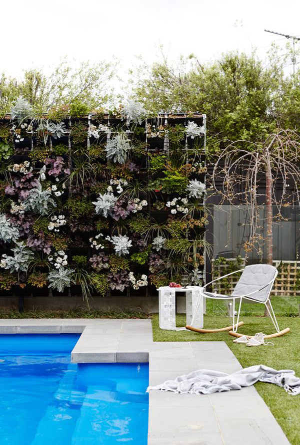 pool-side-garden-landscapes-with-vertical-fence-planters