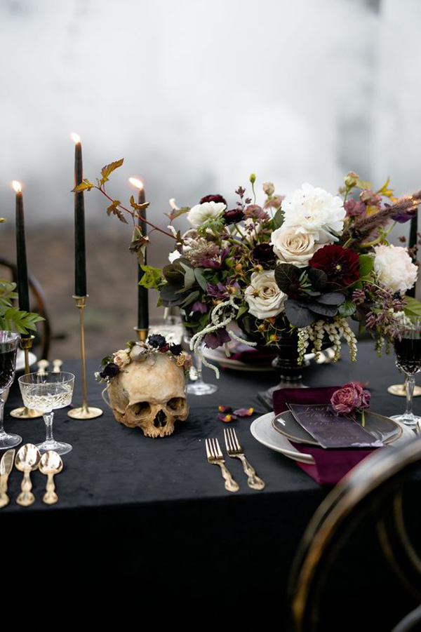 gothic-dark-wedding-tablescape-with-skulls