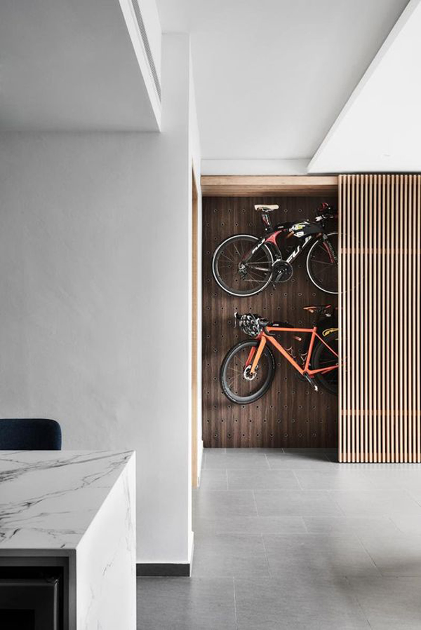 hidden-store-bike-storage-with-wood-sliding-door