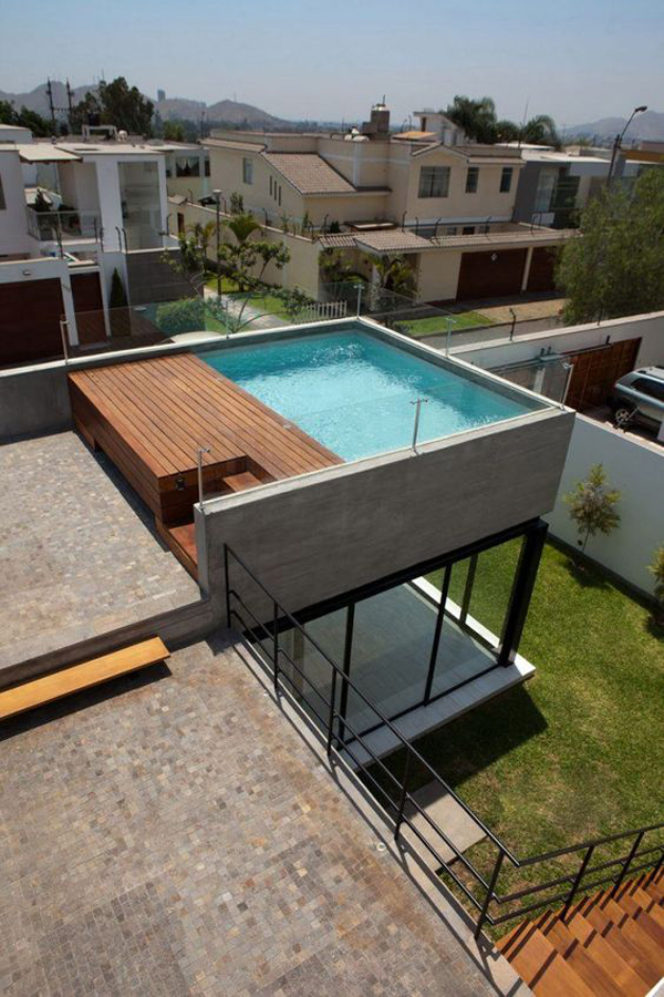 incredible-rooftop-pool-design-with-concrete-accents