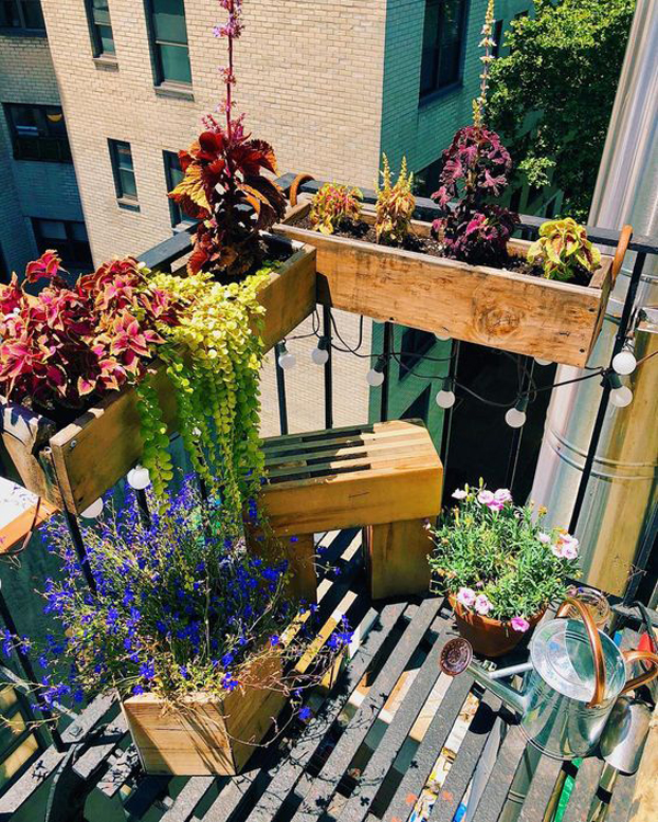 wood-raised-bed-garden-in-the-balcony-fence