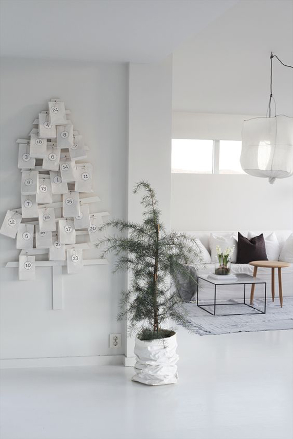 scandinavian-christmas-living-room-design-with-minimalist-tree