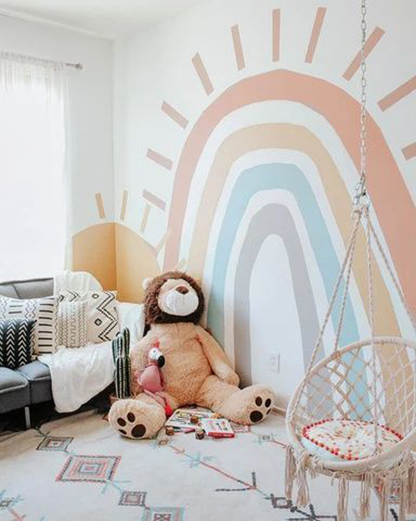 boho-chic-playroom-with-rainbow-wall