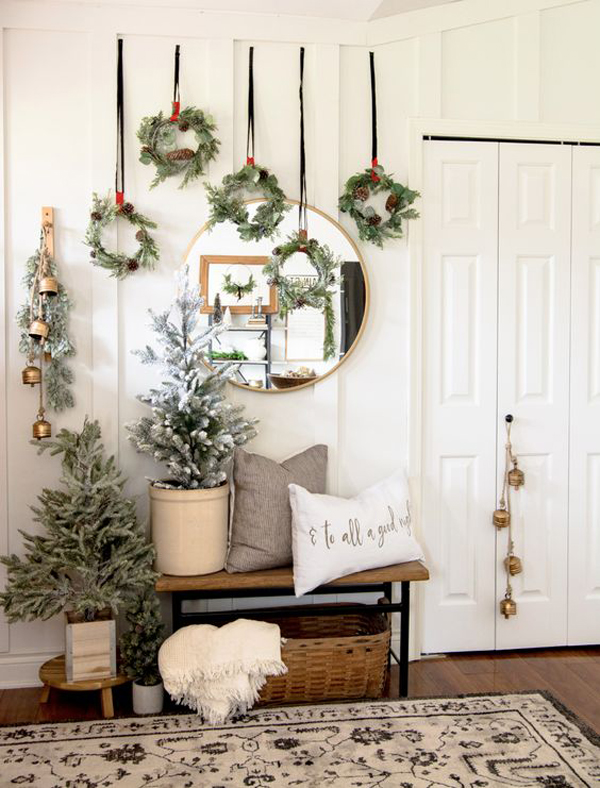 traditional-christmas-entryway-decor-with-hanging-wreaths