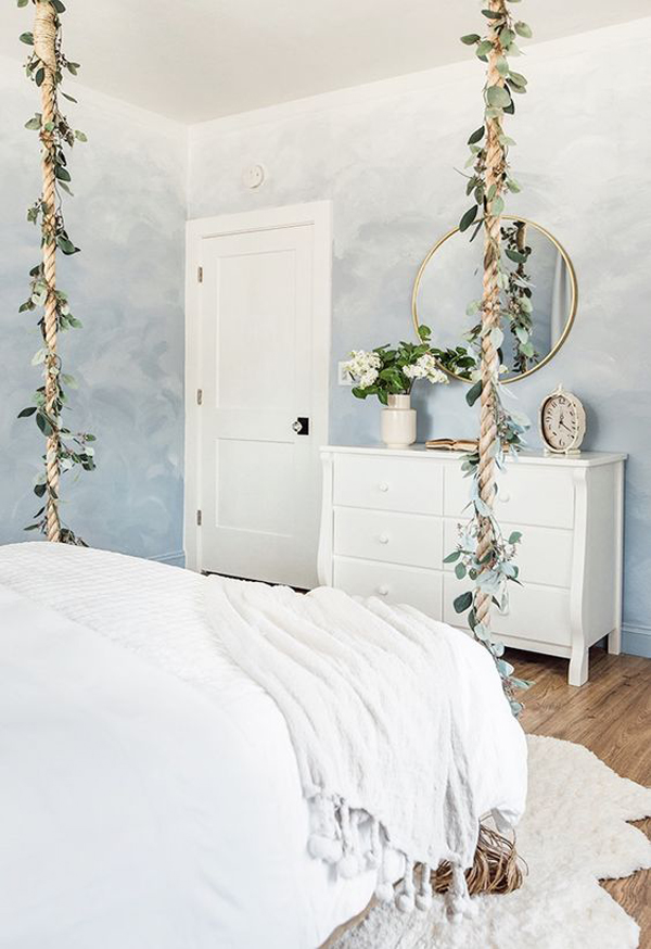 romantic-hanging-bed-with-floral-and-evergreen