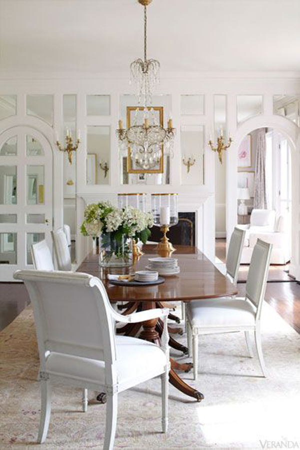 rustic-dining-room-with-wall-moulding-and-mirror