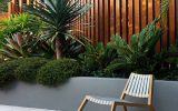 minimalist-sidepool-garden-design-with-chairs