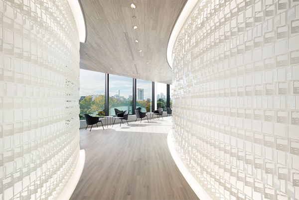 nendo-new-office-with-curved-steel-trading-cards-wall