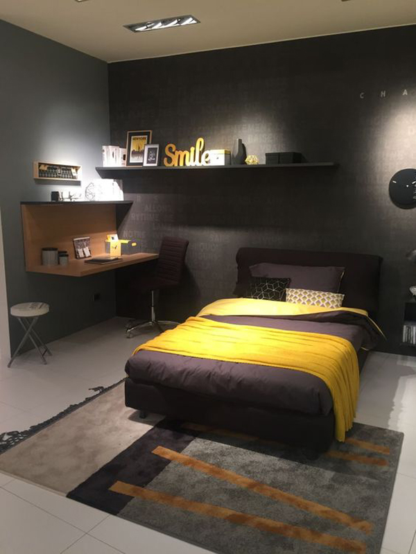 monochrome-yellow-bedroom-with-wall-mounted-shelves