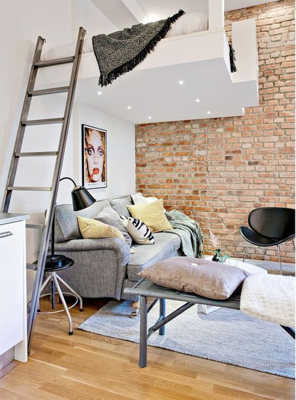 small-living-room-with-mezzanine-floor-and-exposed-brick