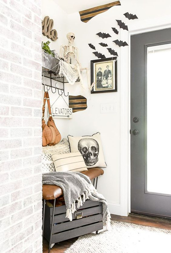 tiny-boho-halloween-entryway-decor-with-skull-cushion