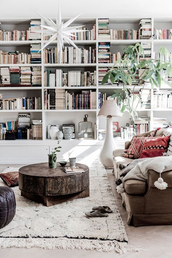 scandinavian-living-space-with-bookshelf-walls