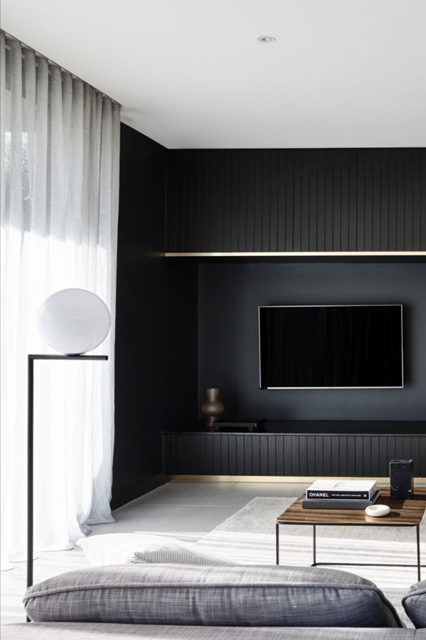 black-tv-room-design-with-natural-light