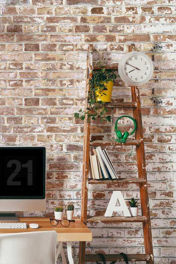 stylish-home-office-with-brick-wall-and-diy-ladder-storage
