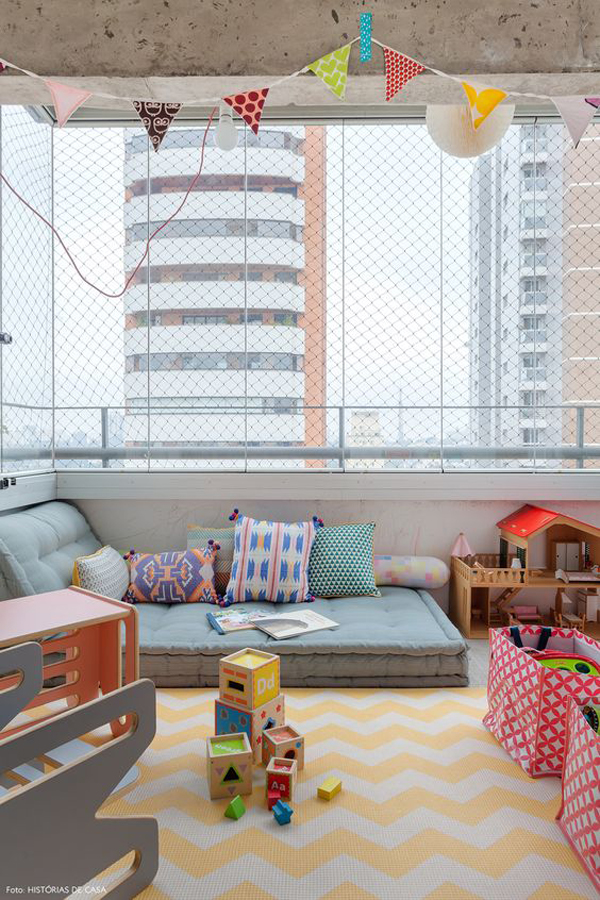 indoor-outdoor-boho-chic-playroom-on-balcony