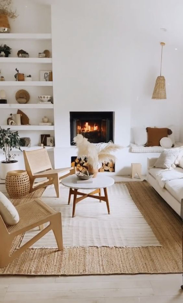 modern-boho-living-room-with-fireplace-and-jute-rugs