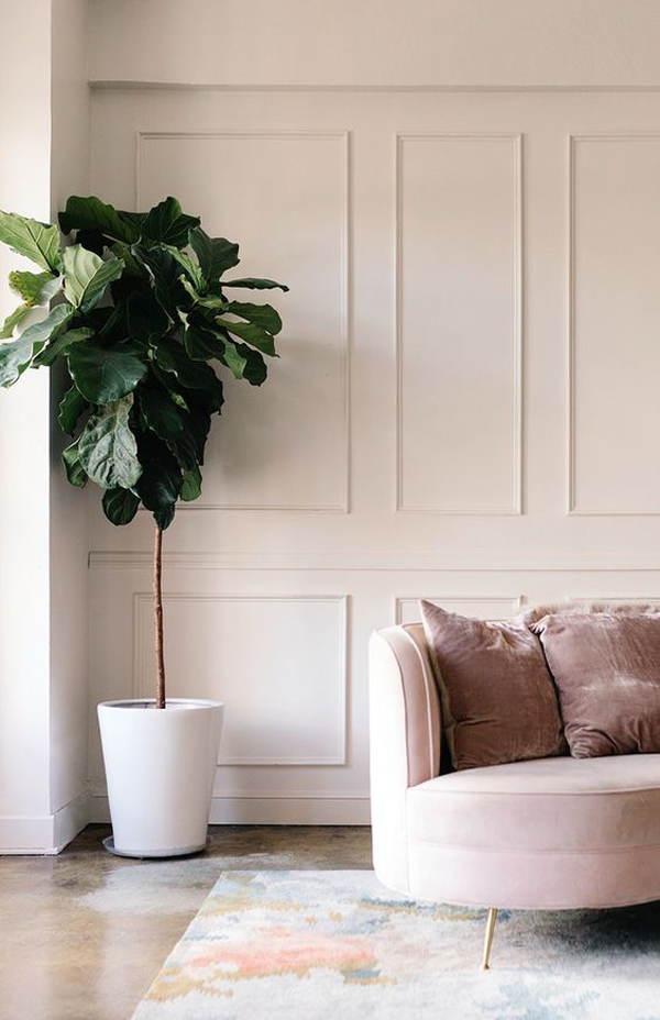 modern-living-room-with-wall-moulding-and-large-plants