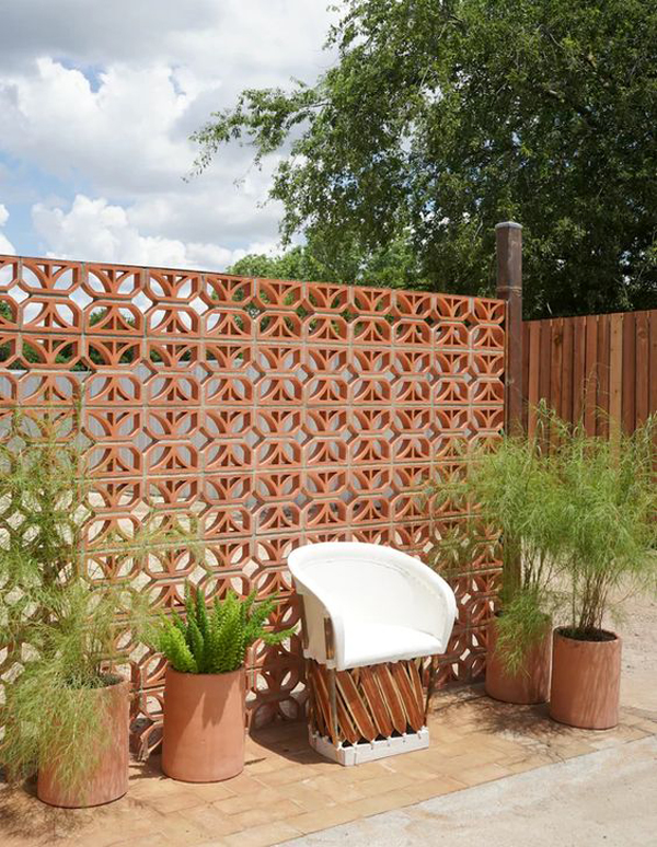 rustic-breeze-block-fence-with-nature-accents