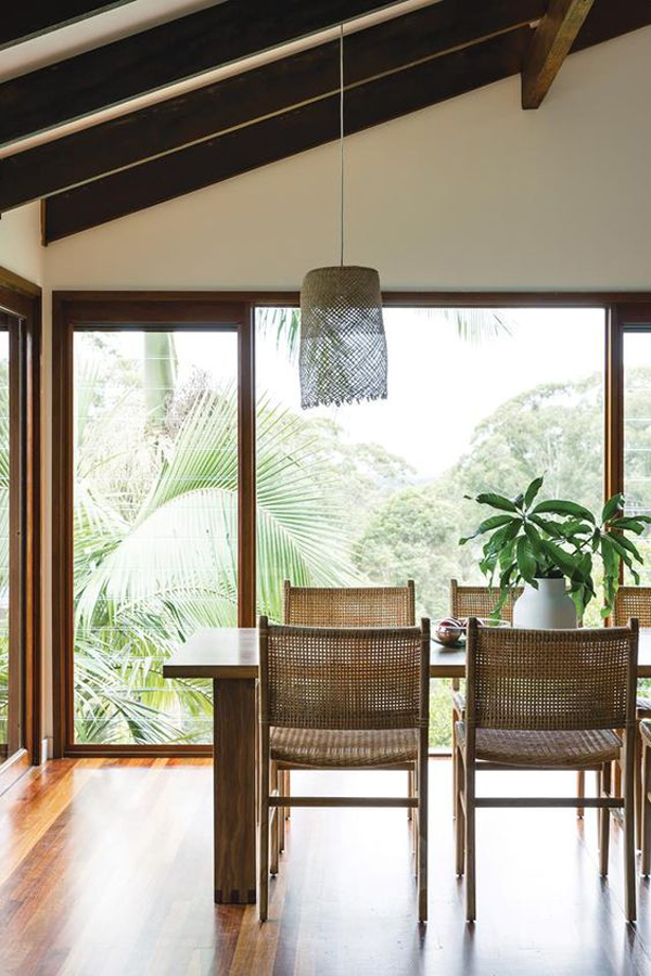 open tropical dining room with rattan furniture