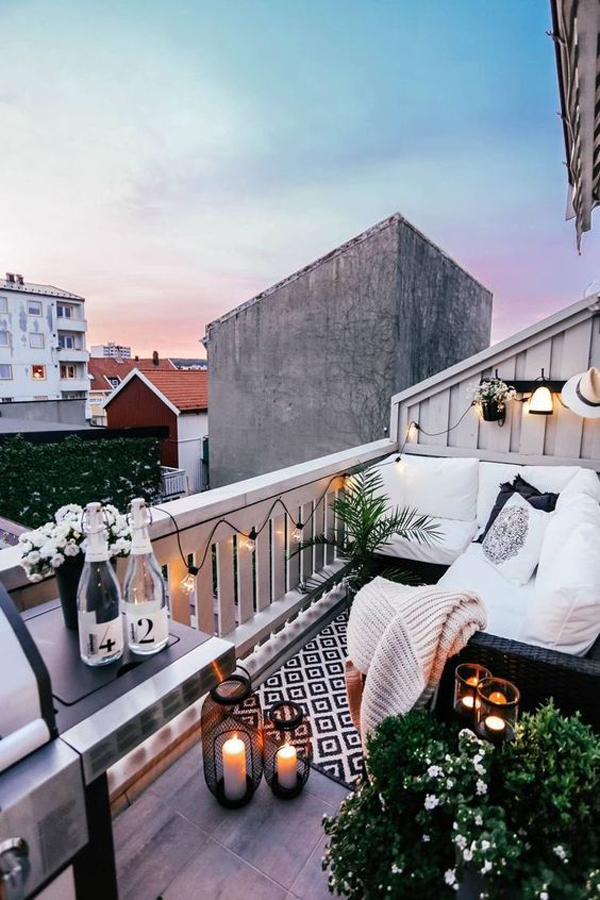 romantic nordic balcony decor with lantern