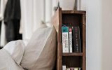 hidden headboard bookshelf with wood accents