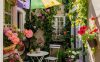 small patio design with rainbow umbrella