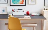 modern and colorful study desk with gallery wall