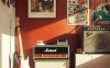 simple teen boy bedroom with guitar stand